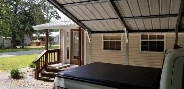 exterior space featuring a hot tub