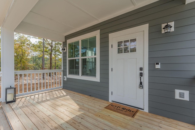 wooden deck featuring covered porch