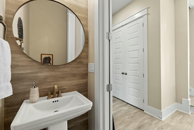 bathroom featuring sink and hardwood / wood-style floors