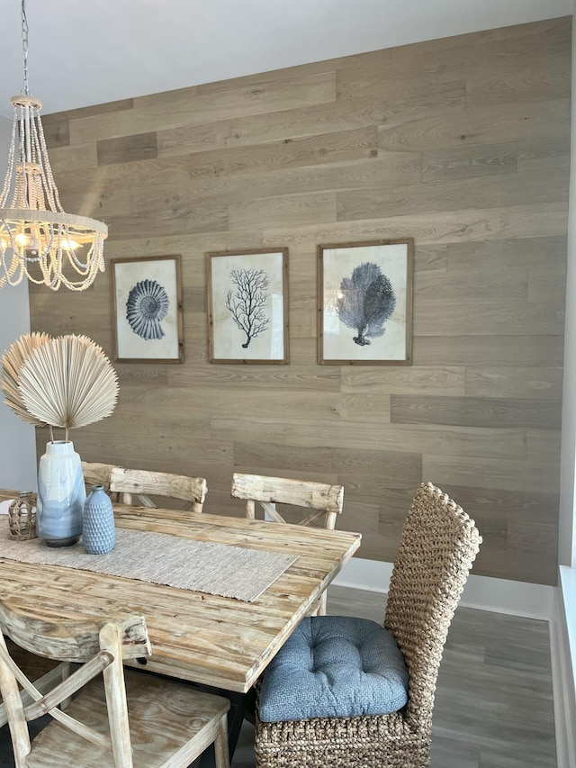 dining space featuring a chandelier