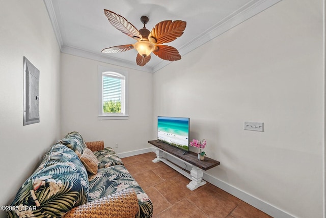 tiled living room with ceiling fan and ornamental molding