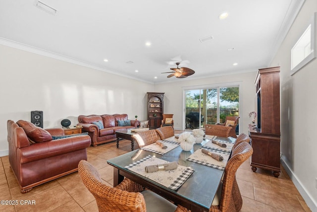 dining room featuring light tile patterned flooring, ceiling fan, and crown molding