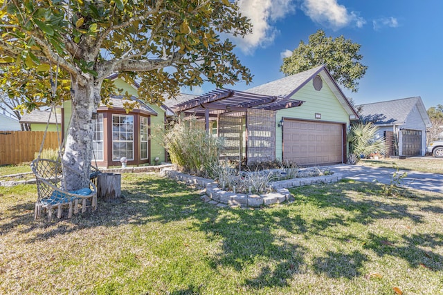 view of front of property with a garage, a pergola, and a front lawn