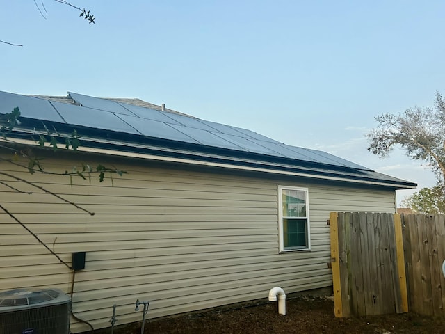 view of home's exterior featuring central AC unit