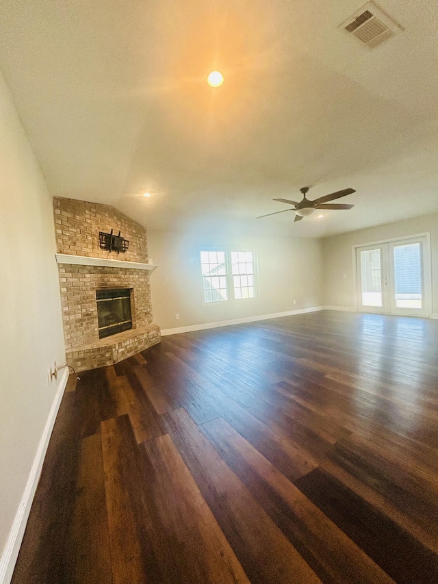 545 J H Crews Cir, Panama City, FL 32404 - unfurnished living room featuring dark wood finished floors, baseboards, ceiling fan, and visible vents