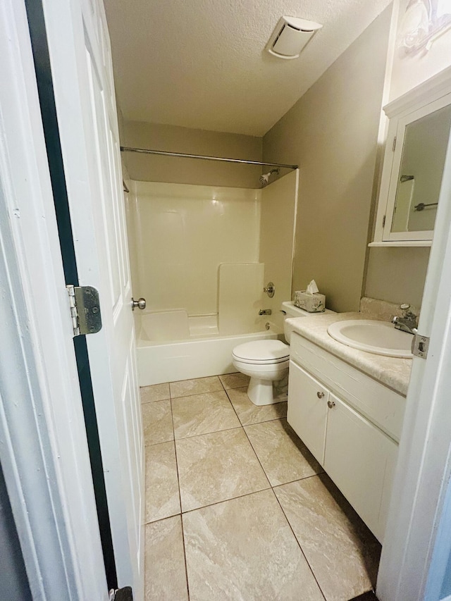 545 J H Crews Cir, Panama City, FL 32404 - bathroom with a textured ceiling, toilet, shower / bathing tub combination, tile patterned flooring, and vanity