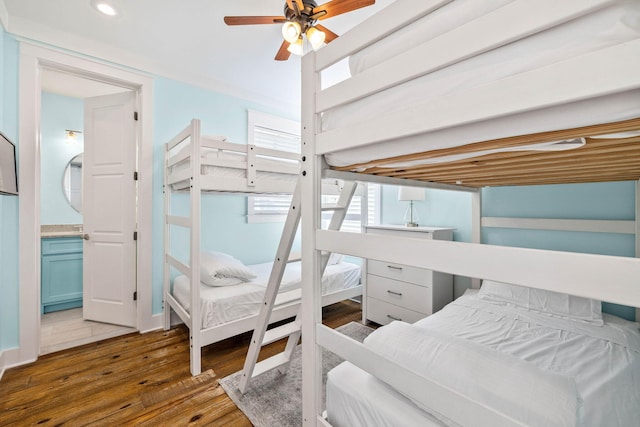 bedroom with dark wood-type flooring