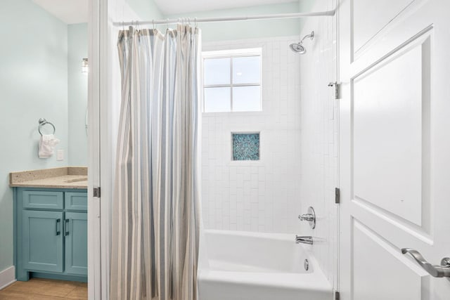 bathroom with vanity and shower / tub combo