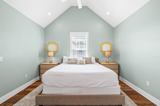 bedroom with dark hardwood / wood-style floors and high vaulted ceiling