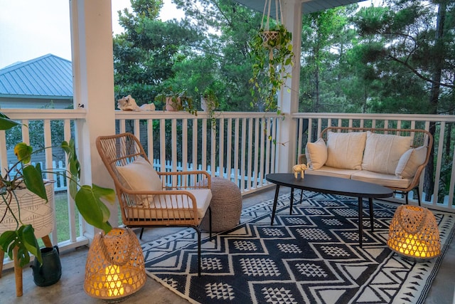 wooden terrace with outdoor lounge area