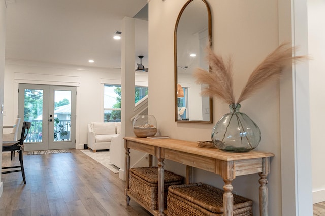 interior space featuring light hardwood / wood-style floors and french doors