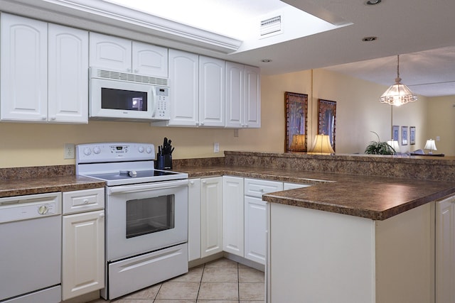 kitchen featuring light tile patterned flooring, decorative light fixtures, white cabinetry, kitchen peninsula, and white appliances