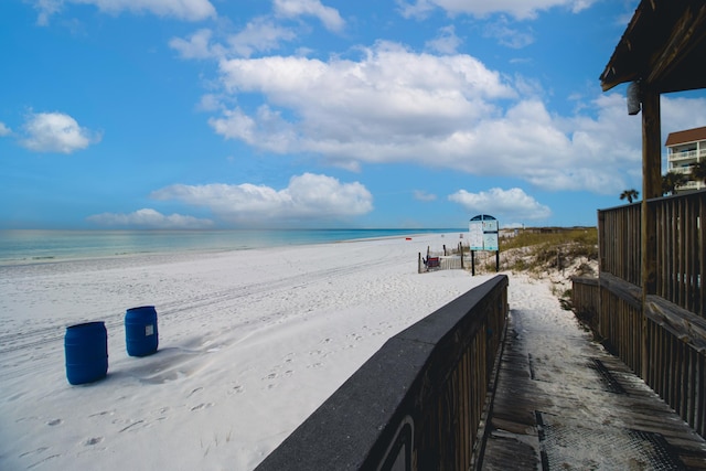 property view of water featuring a beach view