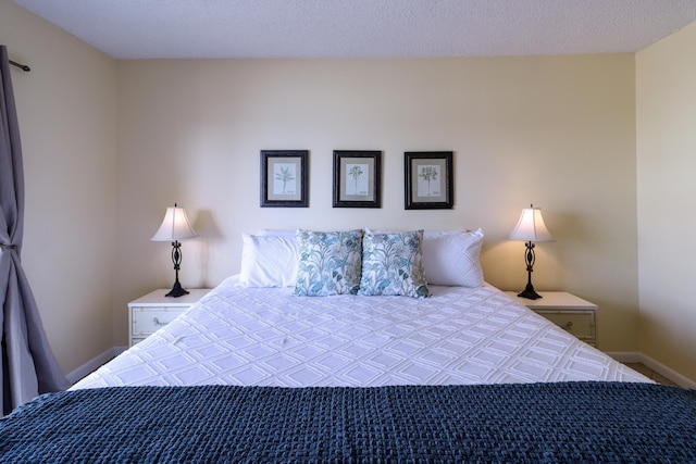 bedroom featuring a textured ceiling