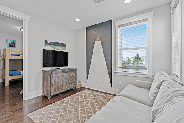 living room with dark hardwood / wood-style floors