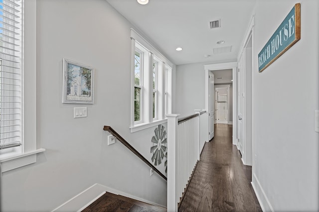 hallway featuring dark wood-type flooring