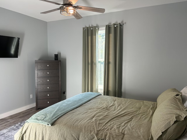 bedroom featuring ceiling fan and hardwood / wood-style floors