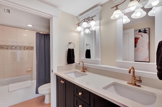 full bathroom with vanity, shower / bathtub combination with curtain, tile patterned floors, and toilet