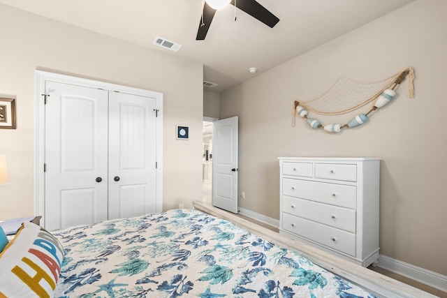 bedroom featuring light hardwood / wood-style flooring, a closet, and ceiling fan