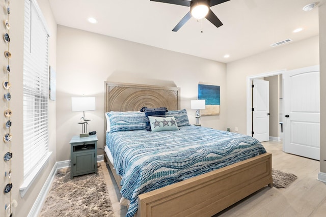 bedroom featuring ceiling fan and light hardwood / wood-style flooring