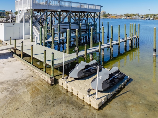 dock area featuring a water view