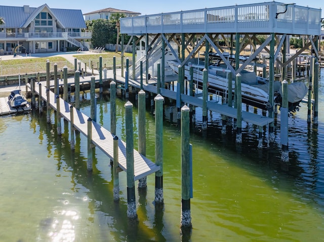 dock area with a water view