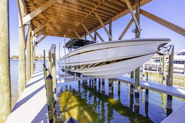 dock area featuring a water view