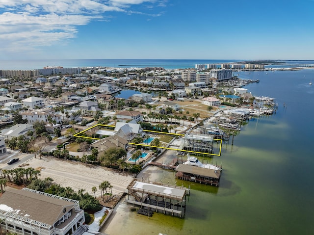 bird's eye view with a water view