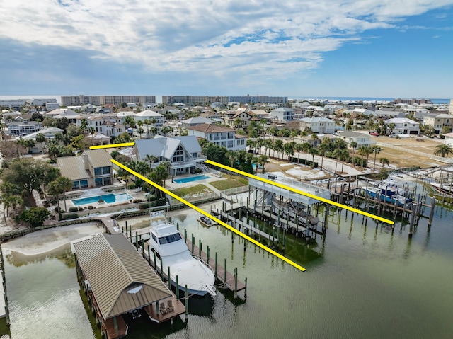 drone / aerial view featuring a water view