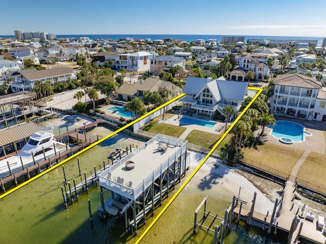 drone / aerial view with a water view