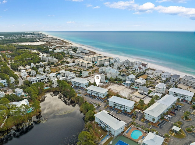 aerial view featuring a view of the beach and a water view