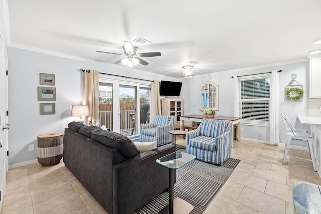 tiled living room featuring ceiling fan and ornamental molding