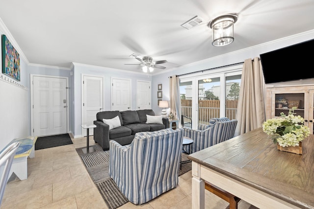 tiled living room with ceiling fan and ornamental molding