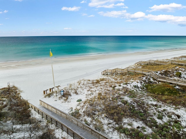 view of water feature with a beach view