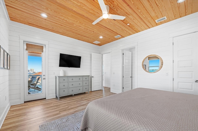 bedroom with wood walls, access to outside, ceiling fan, wood ceiling, and light hardwood / wood-style floors