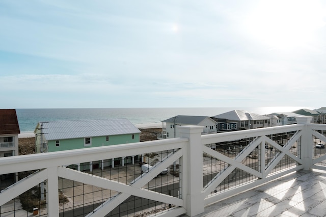 wooden deck with a water view