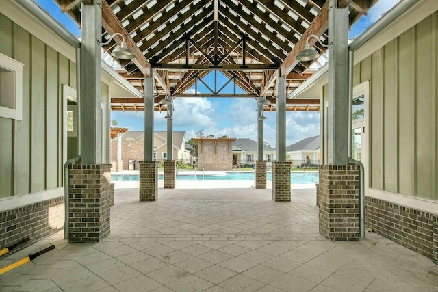 view of patio featuring a community pool