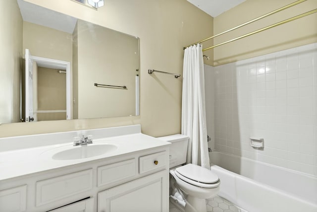 full bathroom with shower / tub combo with curtain, vanity, toilet, and tile patterned floors