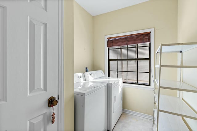 washroom with washer and clothes dryer