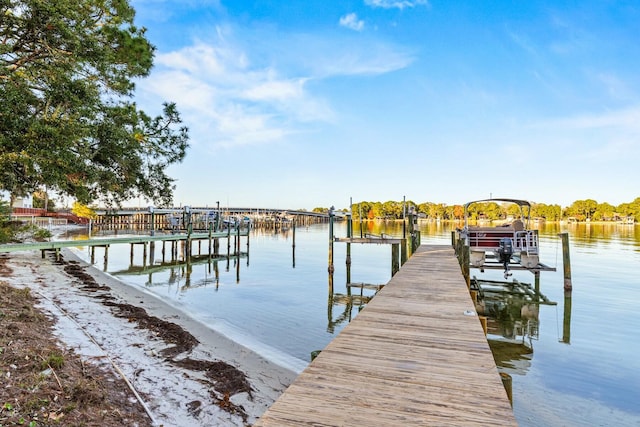 dock area featuring a water view