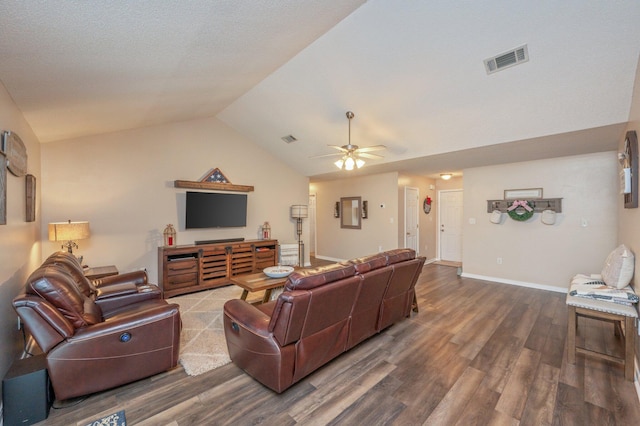 living room with lofted ceiling, dark hardwood / wood-style floors, and ceiling fan