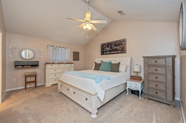 carpeted bedroom with ceiling fan and lofted ceiling