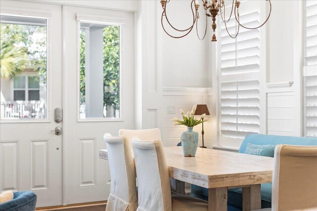 dining space with a chandelier