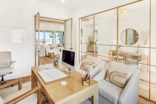 sitting room featuring light hardwood / wood-style floors