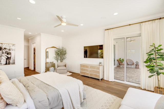 bedroom featuring access to exterior, ornamental molding, light hardwood / wood-style floors, and ceiling fan