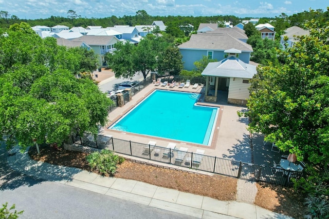 view of swimming pool with a gazebo and a patio area