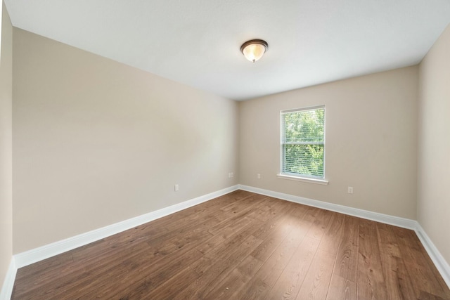 empty room featuring hardwood / wood-style floors