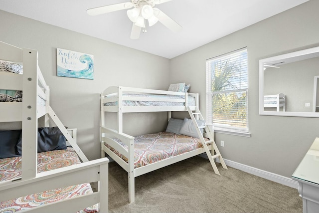 bedroom featuring ceiling fan and carpet floors