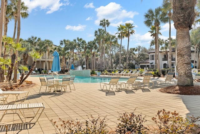 view of swimming pool featuring a patio area