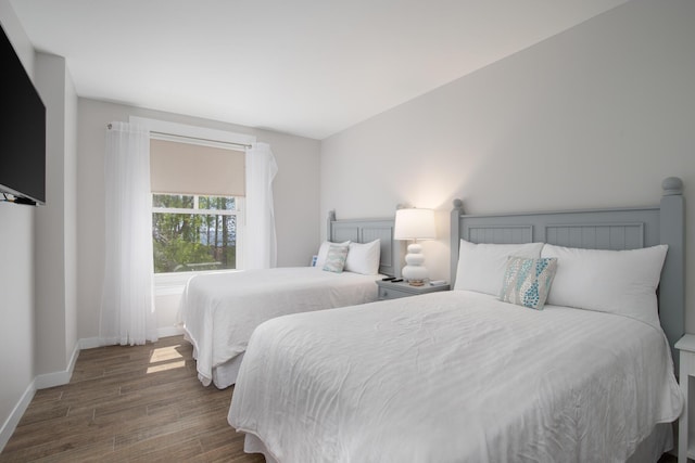 bedroom featuring dark hardwood / wood-style floors